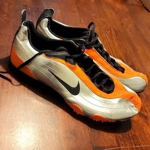 Nike Zoom track spikes. Men's size 11. Silver and orange. New